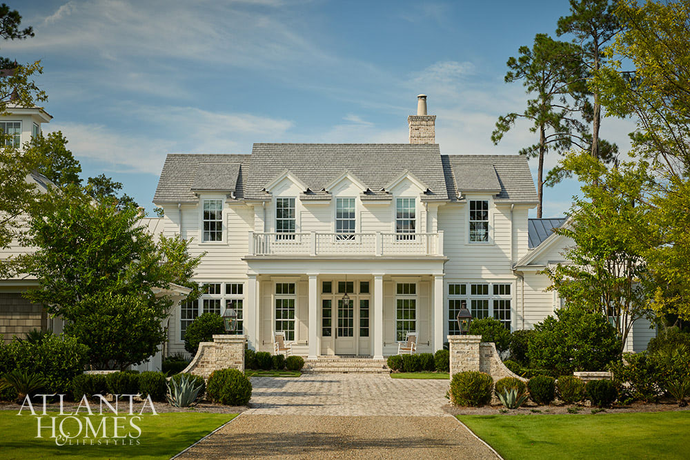 INTERIOR DESIGN: Kim Scodro Interiors| ARCHITECT: William Court, Court Atkins Group | BUILDER: Brett Flanagan, Flanagan Development | LANDSCAPE ARCHITECT: Troy Anderson, Spartina Studio | CABINETRY DESIGN: Jamestown Designer Kitchens | PHOTOGRAPHY: Emily Followill Photography | STYLIST: Eleanor RoperWhite wood coastal home with dorrmers