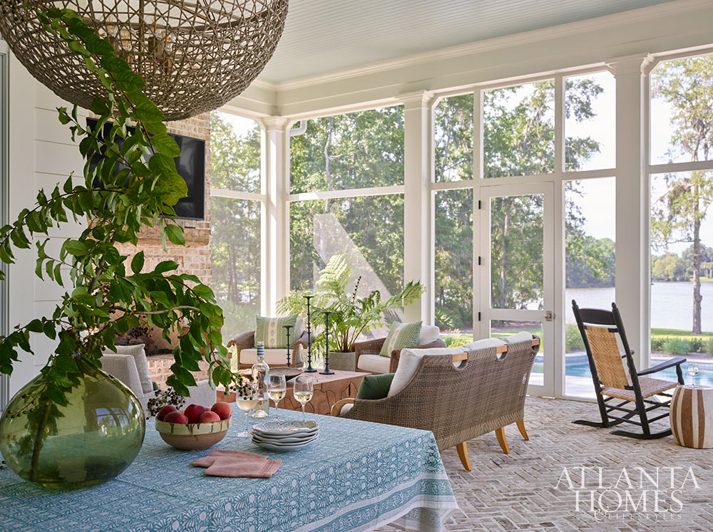 INTERIOR DESIGN: Kim Scodro Interiors| ARCHITECT: William Court, Court Atkins Group | BUILDER: Brett Flanagan, Flanagan Development | LANDSCAPE ARCHITECT: Troy Anderson, Spartina Studio | CABINETRY DESIGN: Jamestown Designer Kitchens | PHOTOGRAPHY: Emily Followill Photography | STYLIST: Eleanor Roperwaterfront screened porch with brick floor