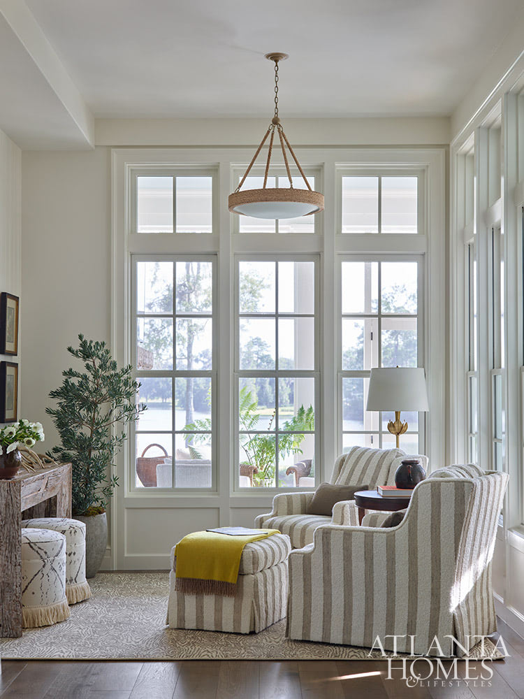 INTERIOR DESIGN: Kim Scodro Interiors| ARCHITECT: William Court, Court Atkins Group | BUILDER: Brett Flanagan, Flanagan Development | LANDSCAPE ARCHITECT: Troy Anderson, Spartina Studio | CABINETRY DESIGN: Jamestown Designer Kitchens | PHOTOGRAPHY: Emily Followill Photography | STYLIST: Eleanor Roper With the days getting longer and the warmer, it's the perfect time to take a trip to a gorgeous St. Simons Island home . Lush surroundings and even lusher interiors make this the ideal getaway. Charming sitting area