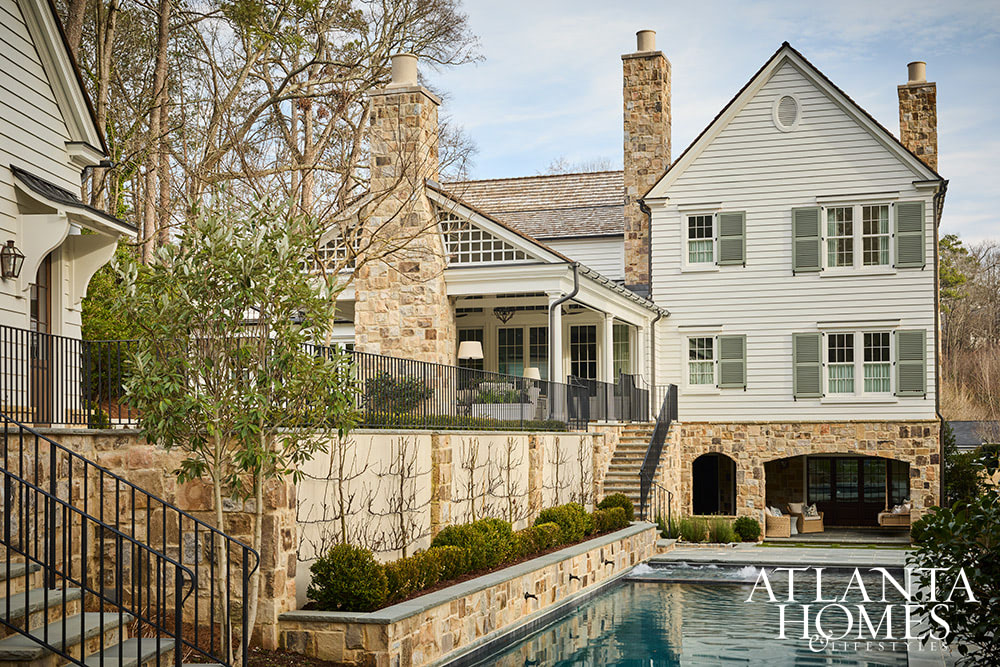 Source: Atlanta Homes & Lifestyles | Interior Design: Nancy Izlar Interiors | Architect: Caroline Rolader, REU Architects | Builder: Wright Marshall and Greg DeLoach, Revival Construction | Landscape Architect: Land Plus | Photographed by Emily Followill | Styled by Holly Bryan and Erin Haraway - beautiful outdoor areawith stone wall