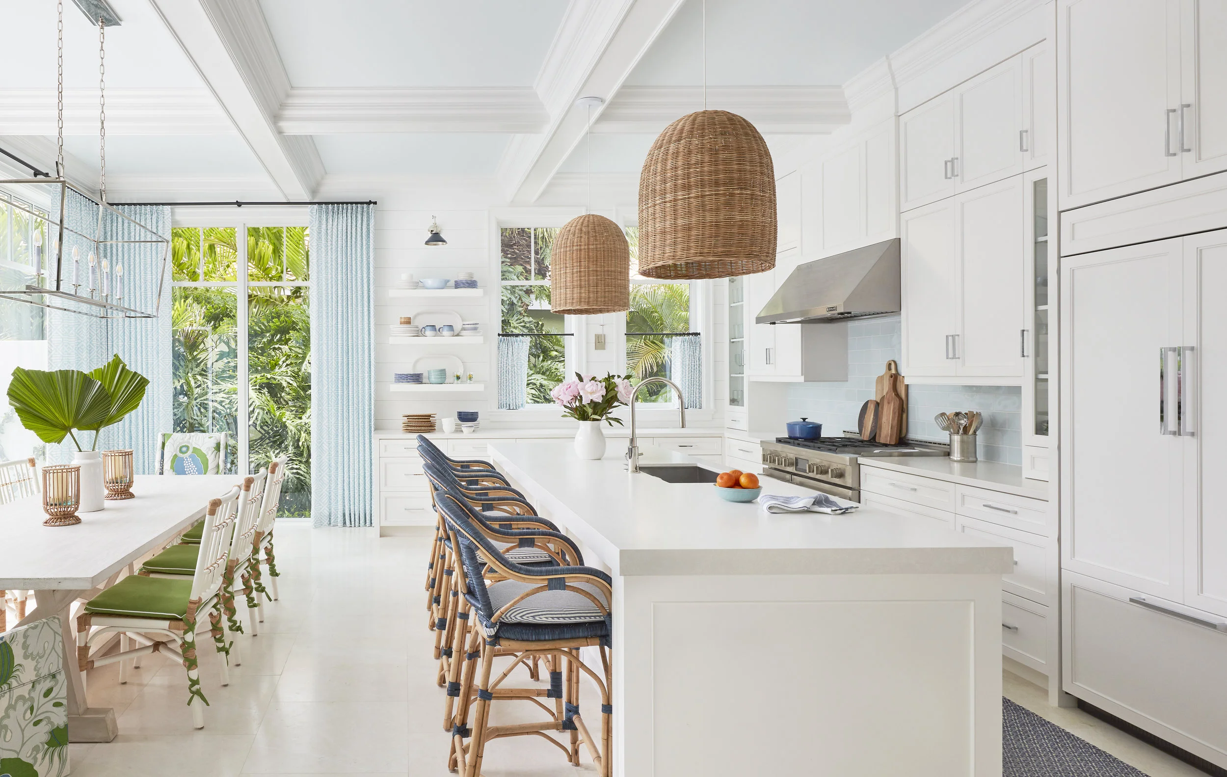 Kara Miller Interiors | Brantley Photography - woven pendant lights over the island in this white kitchen