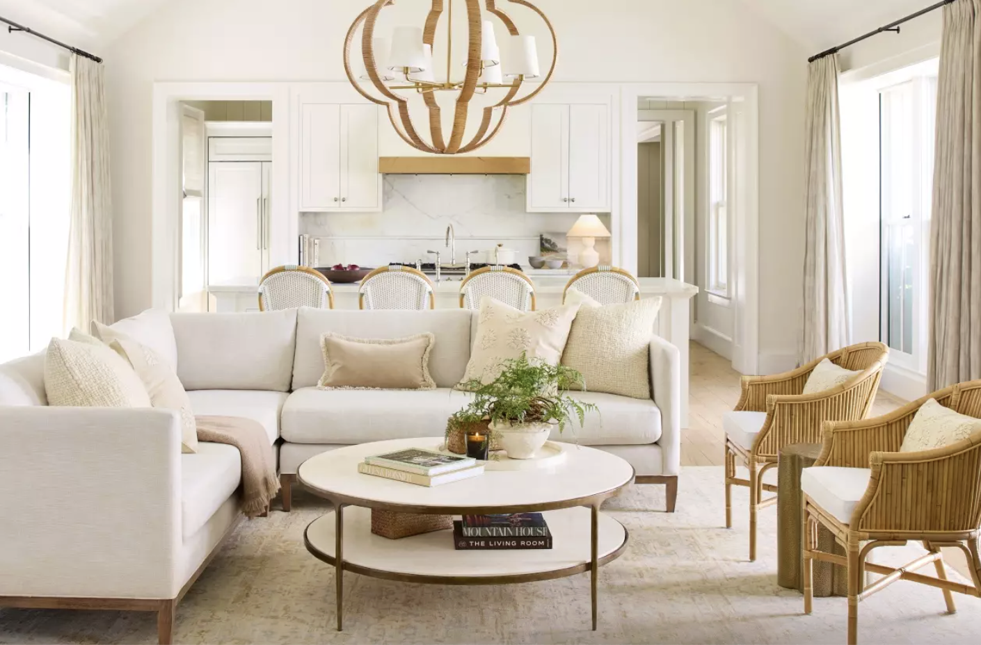 Good morning, chic reader friends.  Nothing says "bright and happy" quite like this fabulous room by our friend Kara Miller. This shows that woven texture in every room adds warmth and style. Love this neutral living room with natural fiber rug