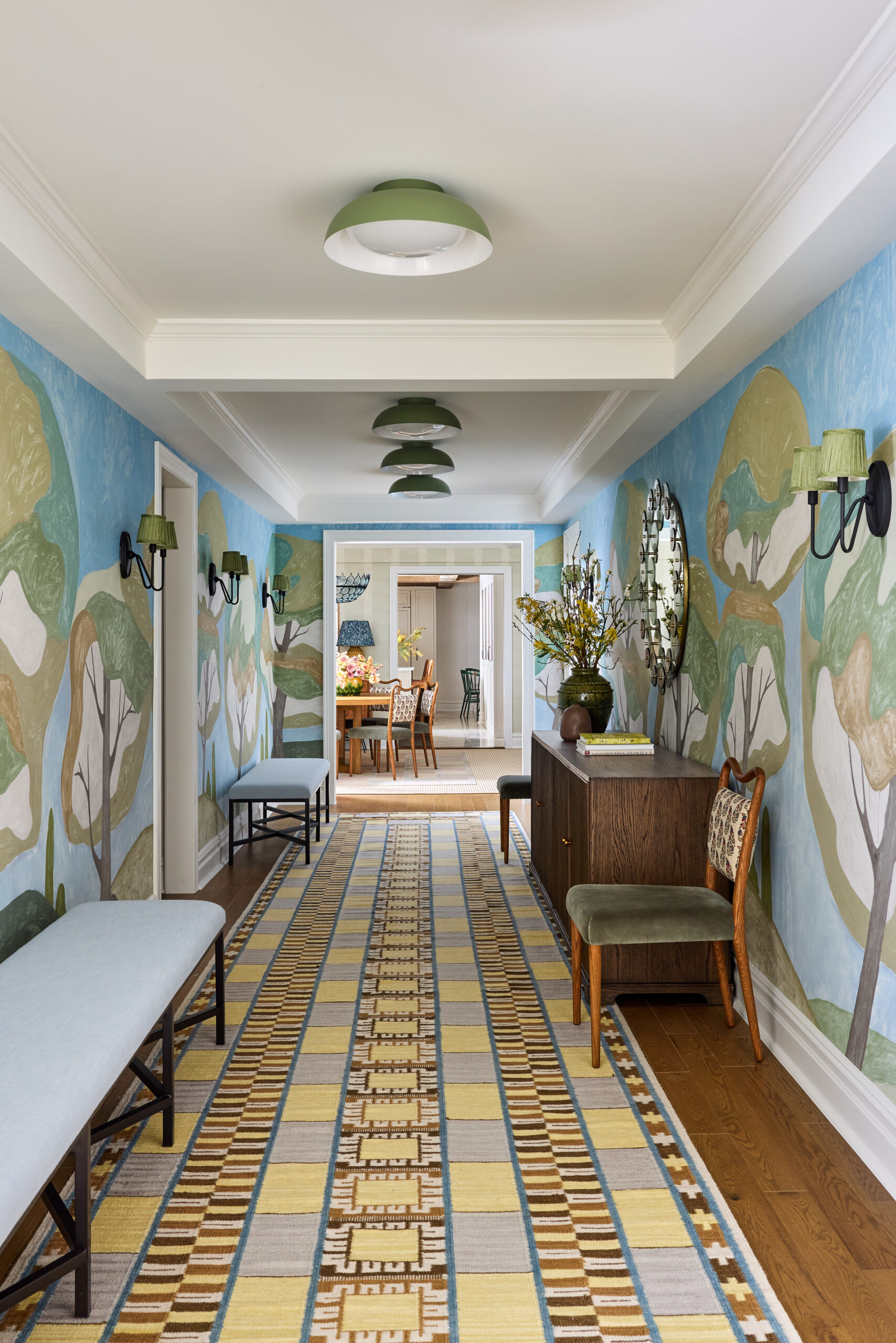 We hope your Wednesday is off to a terrific start. To get it off on the right note, we can't think of anything quite as nice as stepping inside this stunning house designed by Jennifer Hunter, photographed by Kirsten R. Francis, and styled by Martin R. Bourne. Beautiful hand-painted entryway with a stunning runner.