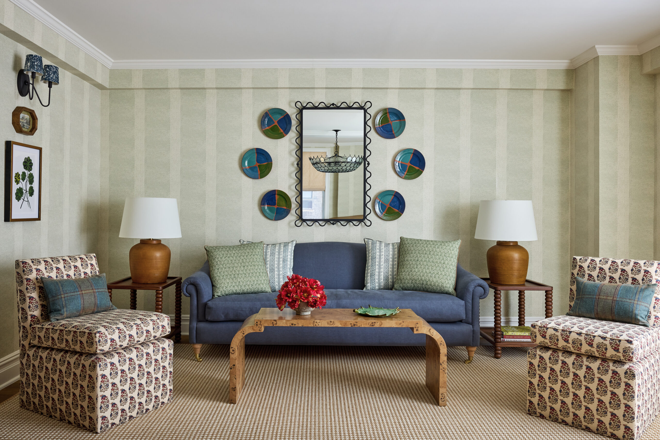 We hope your Wednesday is off to a terrific start. To get it off on the right note, we can't think of anything quite as nice as stepping inside this stunning home tour designed by Jennifer Hunter, photographed by Kirsten R. Francis, and styled by Martin R. Bourne. Beautiful living room with striped wallpaper and burl wood coffee table