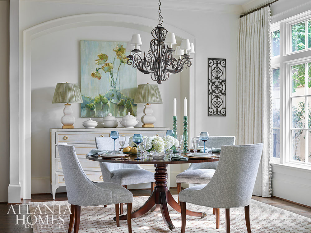 This gorgeous Atlanta, Georgia condo fits a lot of style into a smaller space. It's a perfect example of classic city living done right. Interior Design: Lauren Davenport, Davenport Designs,  Original Architect: Clay Ulmer, Renovation Builder: Matthew Morris, MT Morris Construction, | Photographer: Emily Followill Photography - round dining table 