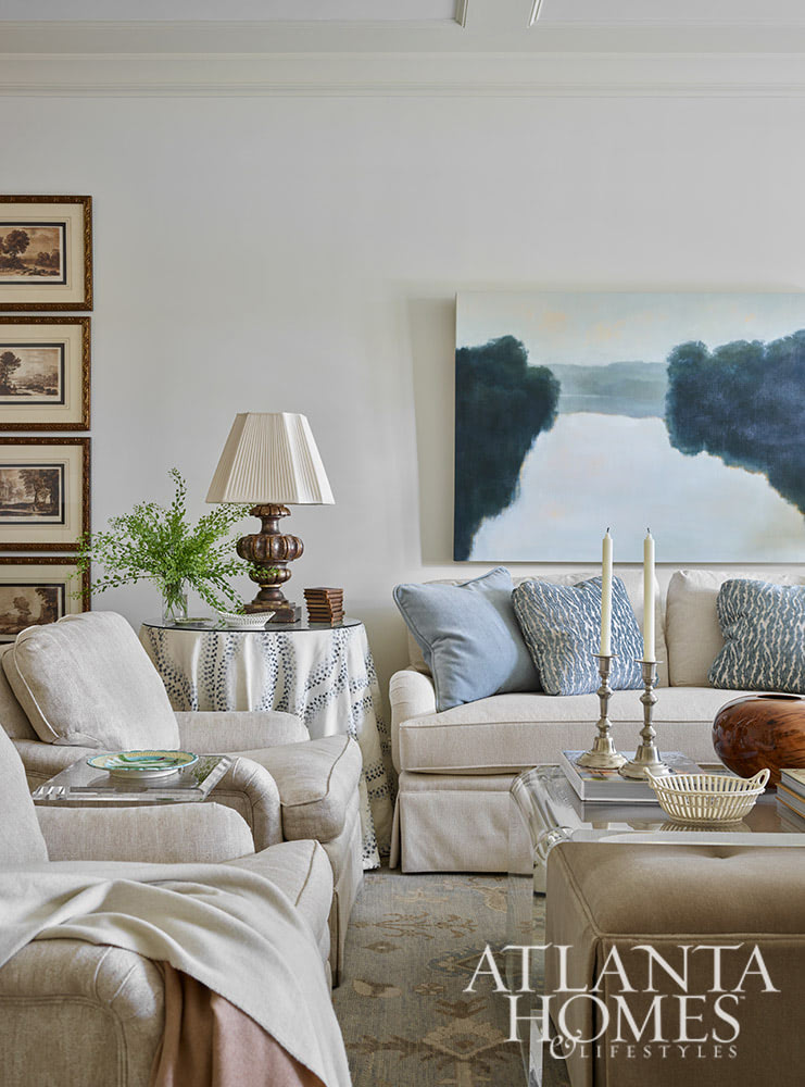 This gorgeous Atlanta, Georgia condo fits a lot of style into a smaller space. It's a perfect example of classic city living done right. Interior Design: Lauren Davenport, Davenport Designs,  Original Architect: Clay Ulmer, Renovation Builder: Matthew Morris, MT Morris Construction, | Photographer: Emily Followill Photography - love the landscape painting over the sofa in the living room