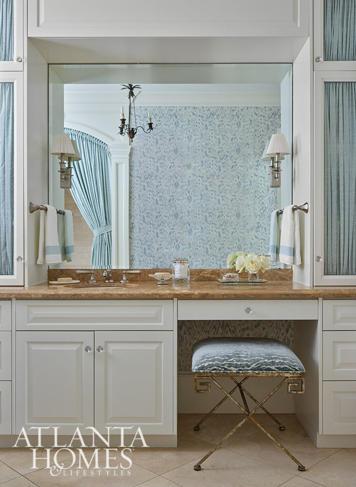 This gorgeous Atlanta, Georgia condo fits a lot of style into a smaller space. It's a perfect example of classic city living done right. Interior Design: Lauren Davenport, Davenport Designs,  Original Architect: Clay Ulmer, Renovation Builder: Matthew Morris, MT Morris Construction, | Photographer: Emily Followill Photography - blue and white bathroom