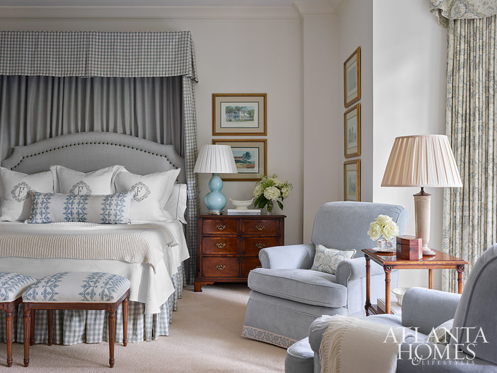This gorgeous Atlanta, Georgia condo fits a lot of style into a smaller space. It's a perfect example of classic city living done right. Interior Design: Lauren Davenport, Davenport Designs,  Original Architect: Clay Ulmer, Renovation Builder: Matthew Morris, MT Morris Construction, | Photographer: Emily Followill Photography - canopy bed in blue and white
