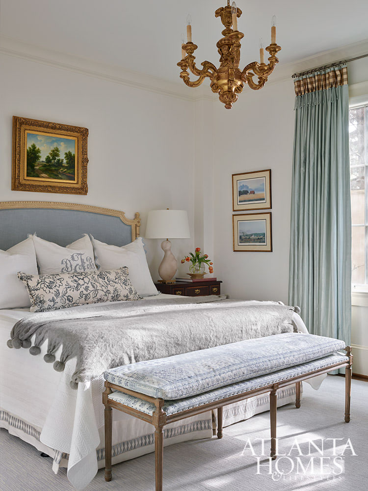 This gorgeous Atlanta, Georgia condo fits a lot of style into a smaller space. It's a perfect example of classic city living done right. Interior Design: Lauren Davenport, Davenport Designs,  Original Architect: Clay Ulmer, Renovation Builder: Matthew Morris, MT Morris Construction, | Photographer: Emily Followill Photography blue and white bedroom