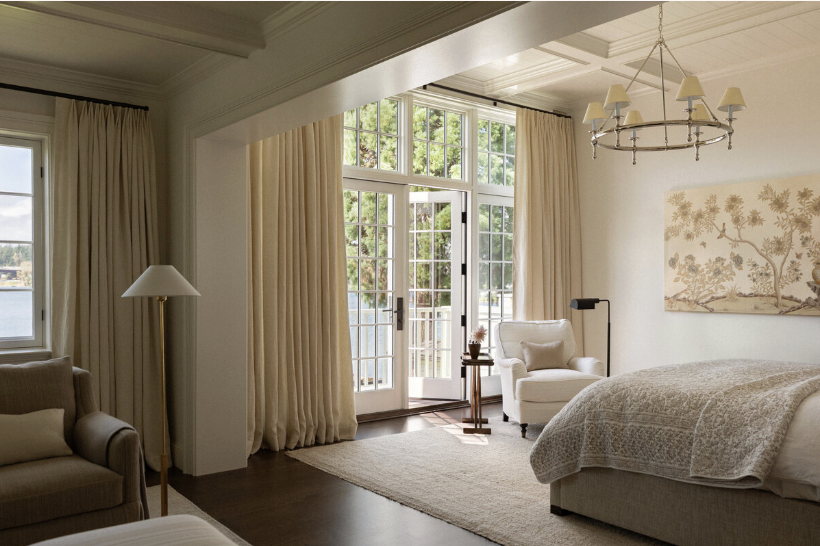 one-of-a-kind place in Lake Washington, designed by the talented Marianne Simon Interior Design, beautifully photographed by Aimee Mazzenga, and styled by Cate Ragan Stylist. - beautiful bedroom with french doors and a sitting room