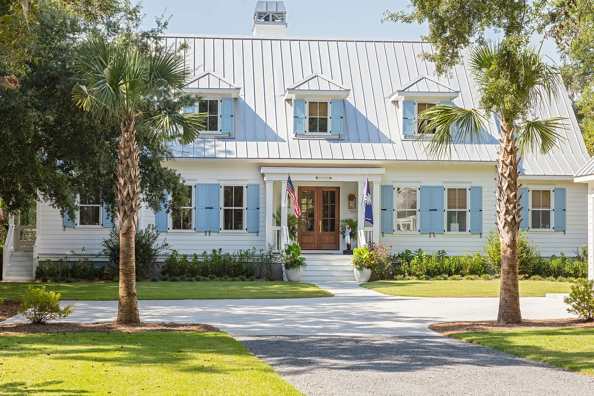 With summer officially here and beach season in full swing, we thought it made sense to see a beach house today--as if we need an excuse! This home designed by the talented Grace Frederick and photographed by Julia Lynn is the perfect mix of updated beauty and that classic, but fun, beach cottage chic that makes this the kind of place we would want to come back to again and again. Take the tour, and we think you'll agree! Obsessed with the Mario Torres chandelier in the living room