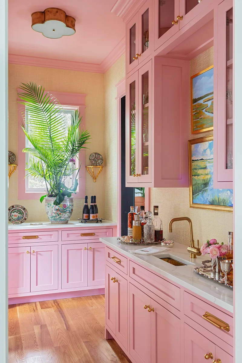 With summer officially here and beach season in full swing, we thought it made sense to go on an amazing coastal home tour  today--as if we need an excuse! This home designed by the talented Grace Frederick and photographed by Julia Lynn is the perfect mix of updated beauty and that classic, but fun, beach cottage chic that makes this the kind of place we would want to come back to again and again. Take the tour, and we think you'll agree! Obsessed with the Mario Torres chandelier in the living room