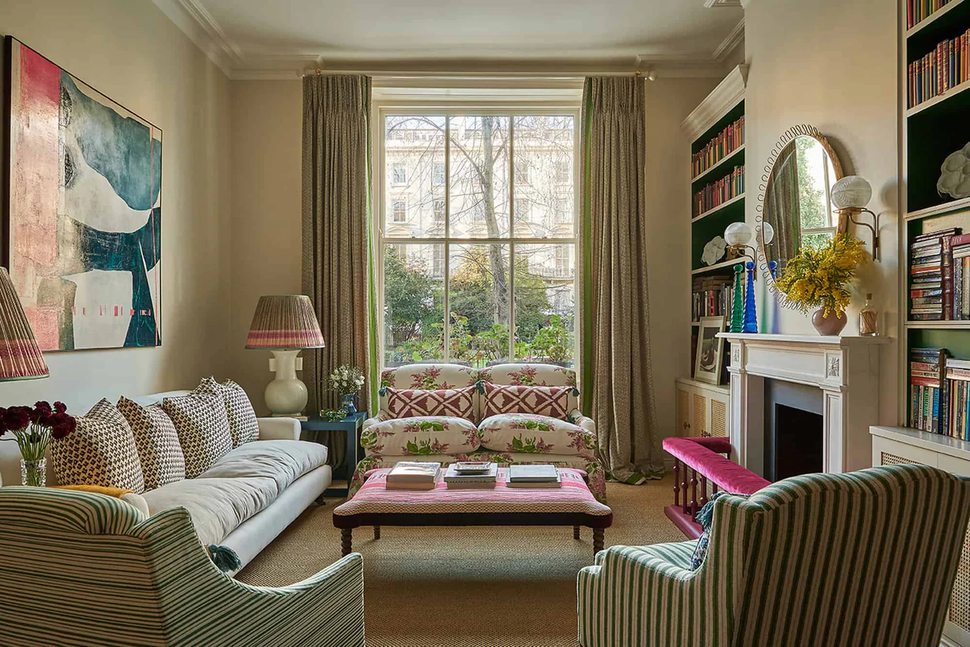 From stately showplaces to perfectly choreographed moments, a mix of old and new, to a well-collected focal point, the designers of Vanrenen Hanbury of the UK know a thing or two about hitting the high notes of style. Take a peek at this Notting Hill apartment with extraordinary design details, beautifully photographed by Mike Garlick, and we think you'll agree! Beautiful abstract art in this living room with fabulous details