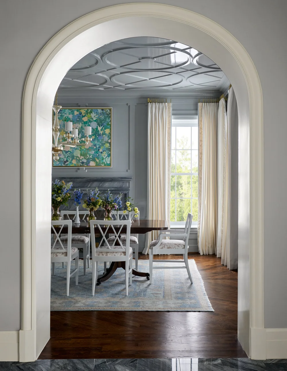 Mary Beth Wagner Interiors | Nathan Schroder Photography - In our lives and in our homes, the best things in life are quite often the ones that stand the test of time. Love the arched doorway and beautiful paneled ceiing