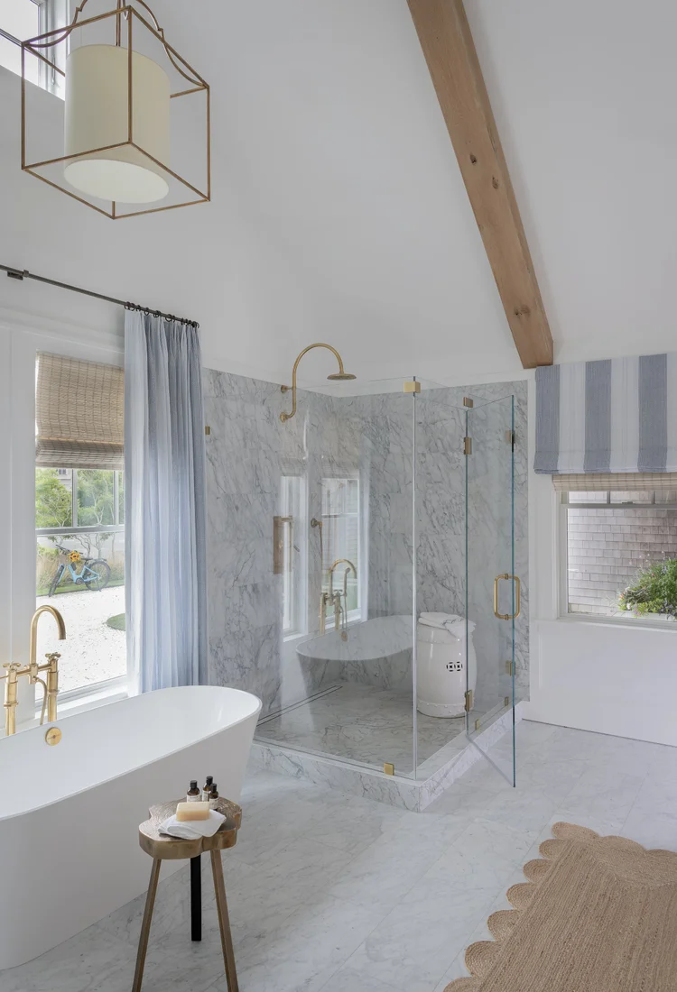 With summer officially here and beach season in full swing, we thought it made sense to tour an amazing Nantucket shingled cottage today--as if we need an excuse! This home designed by Workshop/ADP, with interiors by the talented Jessica Bradley and built by Blue Flag Partners is the perfect mix of updated beauty and that classic beach cottage chic that makes this the kind of place we would want to come back to again and again.