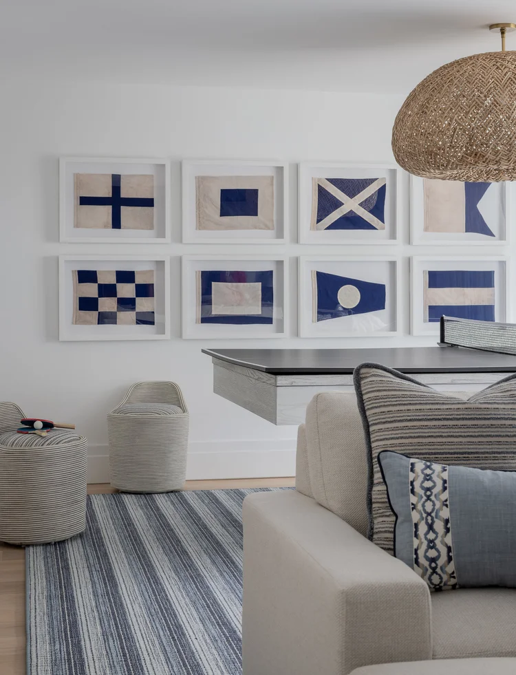 With summer officially here and beach season in full swing, we thought it made sense to tour an amazing Nantucket shingled cottage today--as if we need an excuse! This home designed by Workshop/ADP, with interiors by the talented Jessica Bradley and built by Blue Flag Partners is the perfect mix of updated beauty and that classic beach cottage chic that makes this the kind of place we would want to come back to again and again.