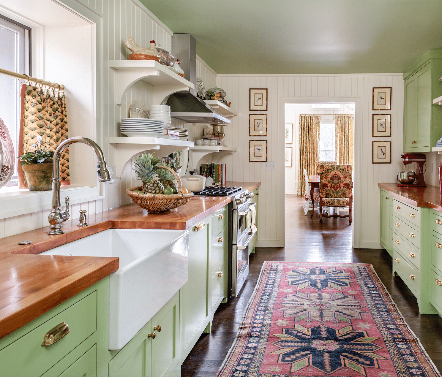 James Farmer Design | Jeff Herr Photography - green kitchen with butcher block countertops