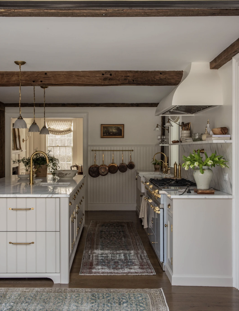 Carley Summers kitchen with wood beams and copper pots
