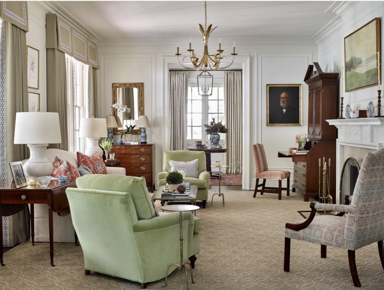 Interior Designer: Jessica Bradley Interiors | Architect: Frank Neely | Builder: Davey Construction | Photographer: Emily Followill | classic home design ideas for a beautiful livingrinn with family portraits and antique furniture.