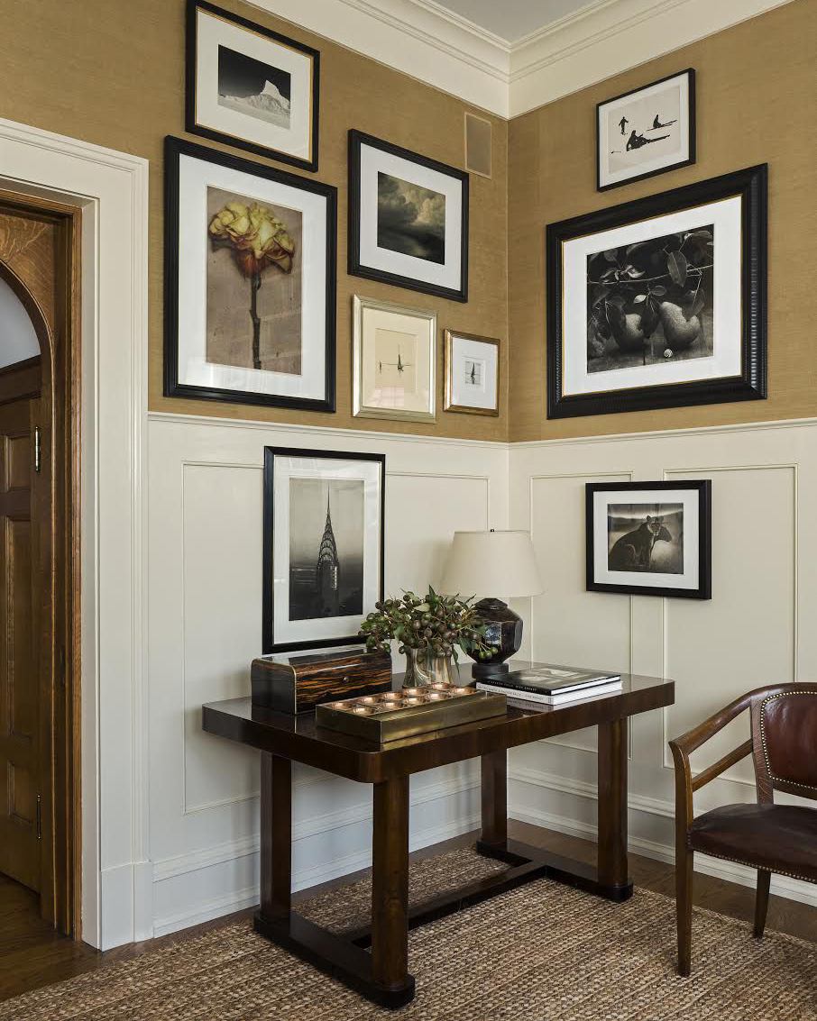 charming alcove with rectangular table and gallery wall and collected style