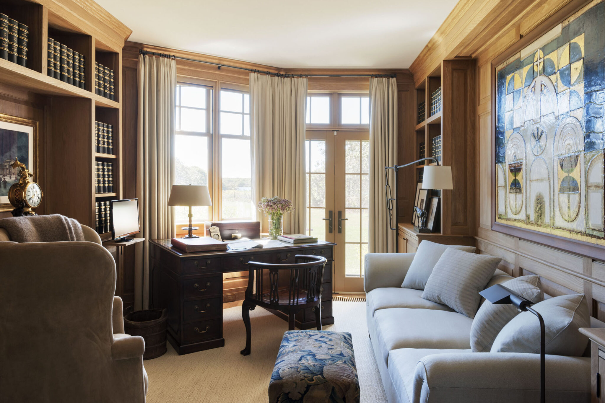 Classic home library with floor to ceiling bookcases and a traditional design