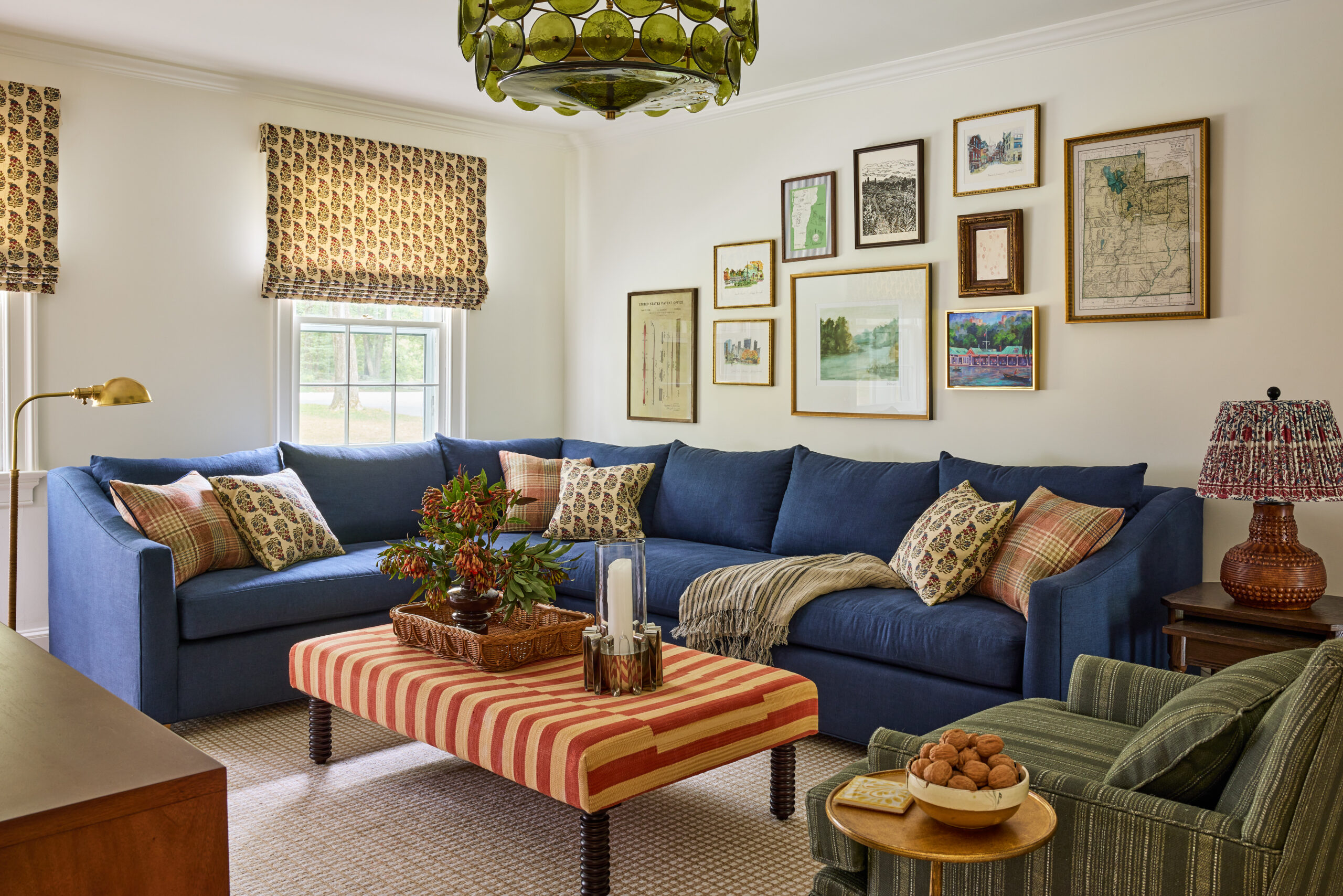 Adore this living room with the gallery wall above the sofa and the sectional sofa