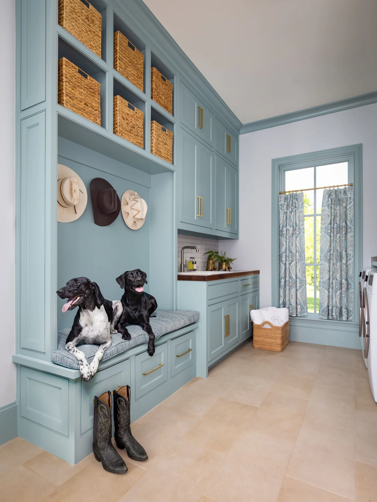 Blue mudroom with basket storage