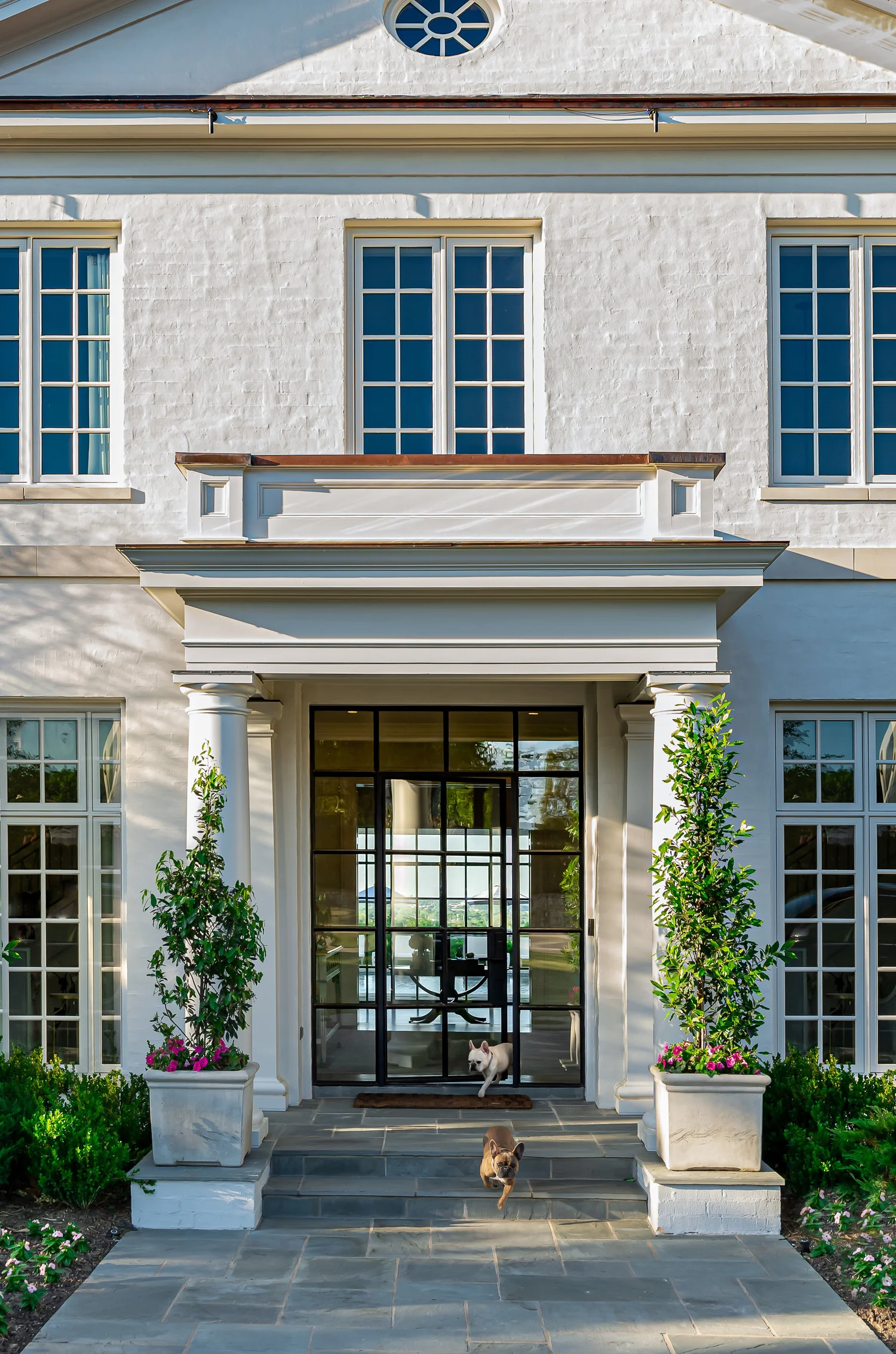 Beautiful home with a glass and steel front door