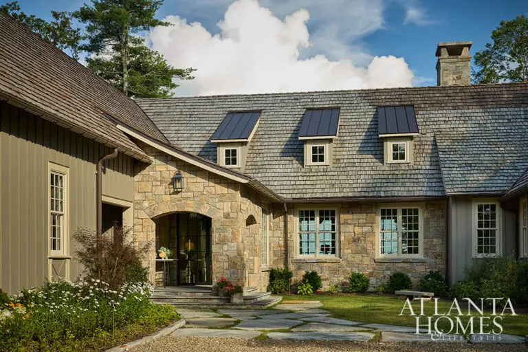 This fabulous mountain retreat is the perfect place to spend a summer day–and a great place to curl up by the fire come fall. Curb appeal with stone exterior