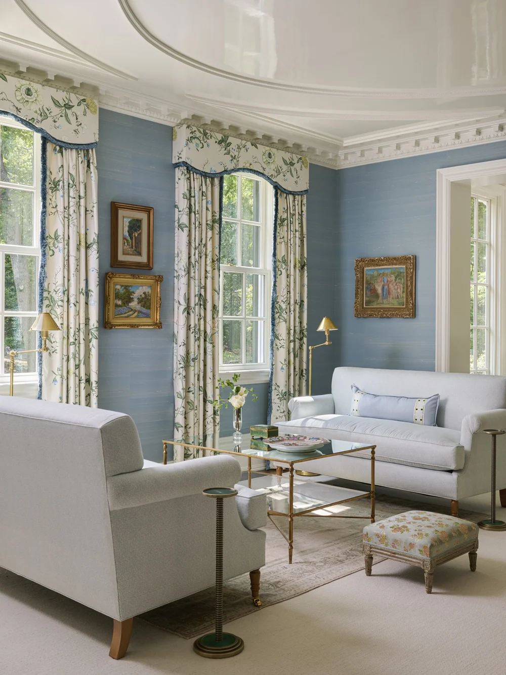 We are so excited to tour this gorgeous Dallas home designed by Jenkins Interiors and photographed by K8 Creative. Living room with blue grasscloth and a pair of white sofas