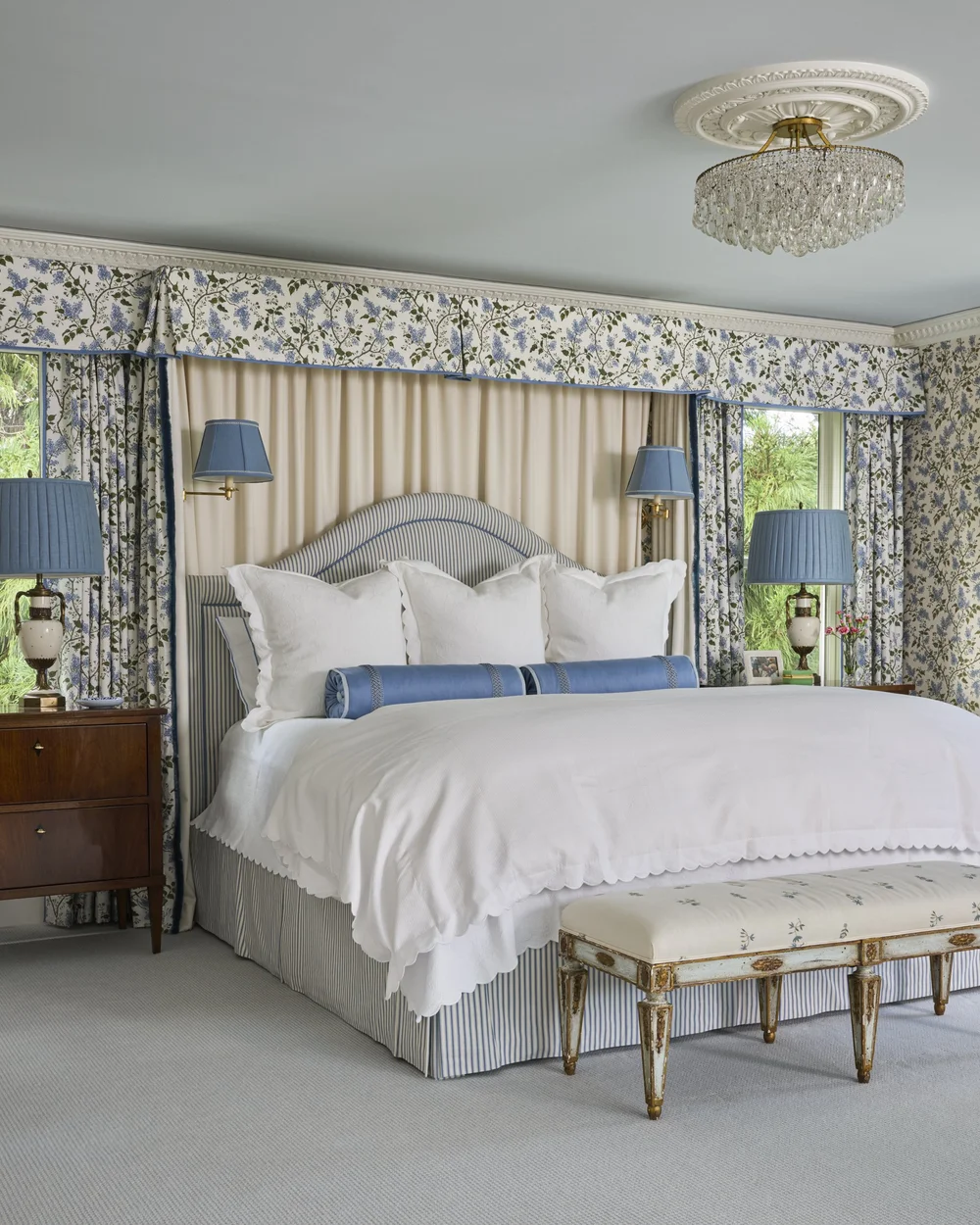 We are so excited to see this gorgeous blue and white primary bedroom designed by Jenkins Interiors and photographed by K8 Creative.