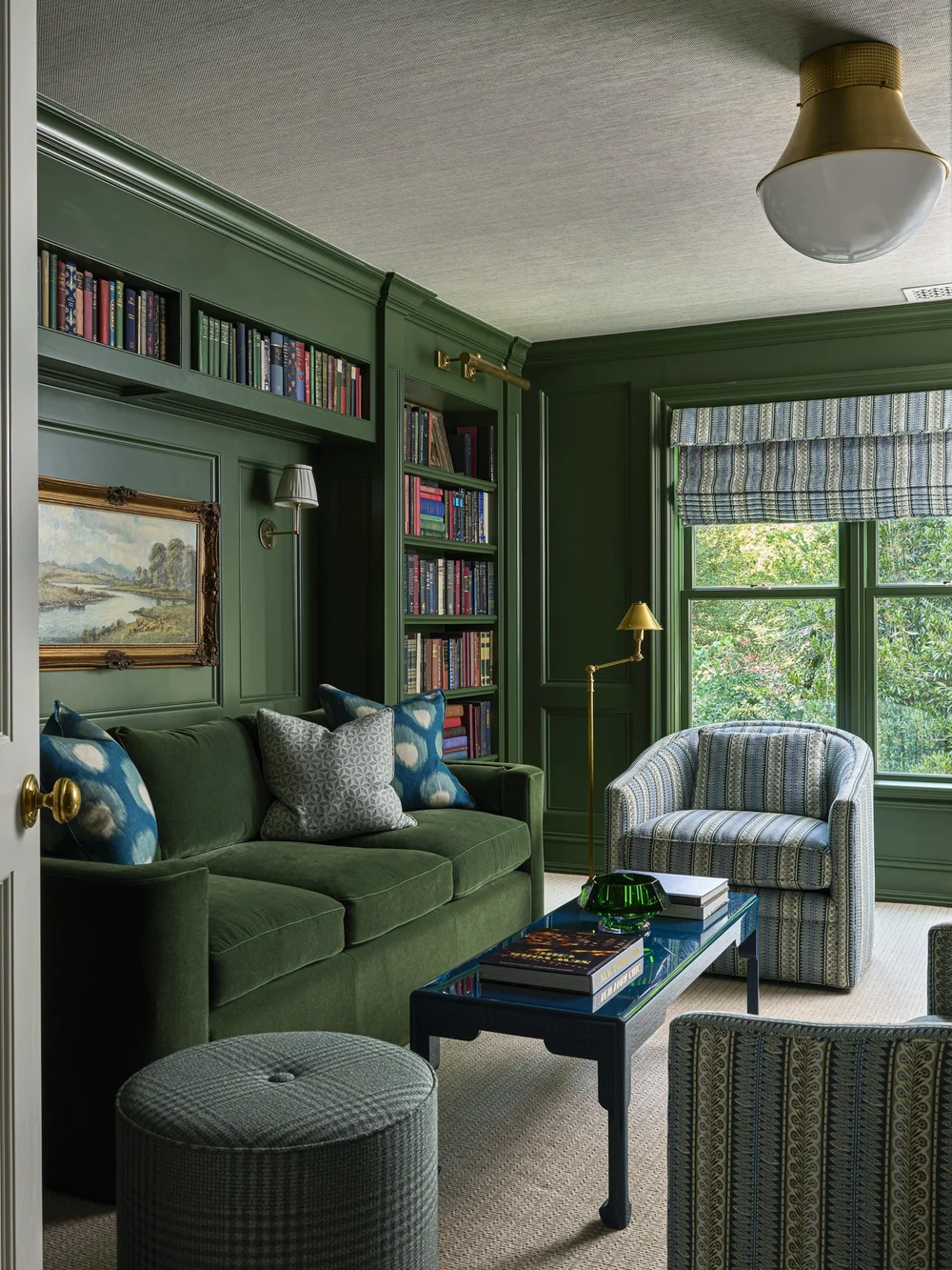 We love the gorgeous living room with green velvet sofa in this Dallas home designed by Jenkins Interiors and photographed by K8 Creative.