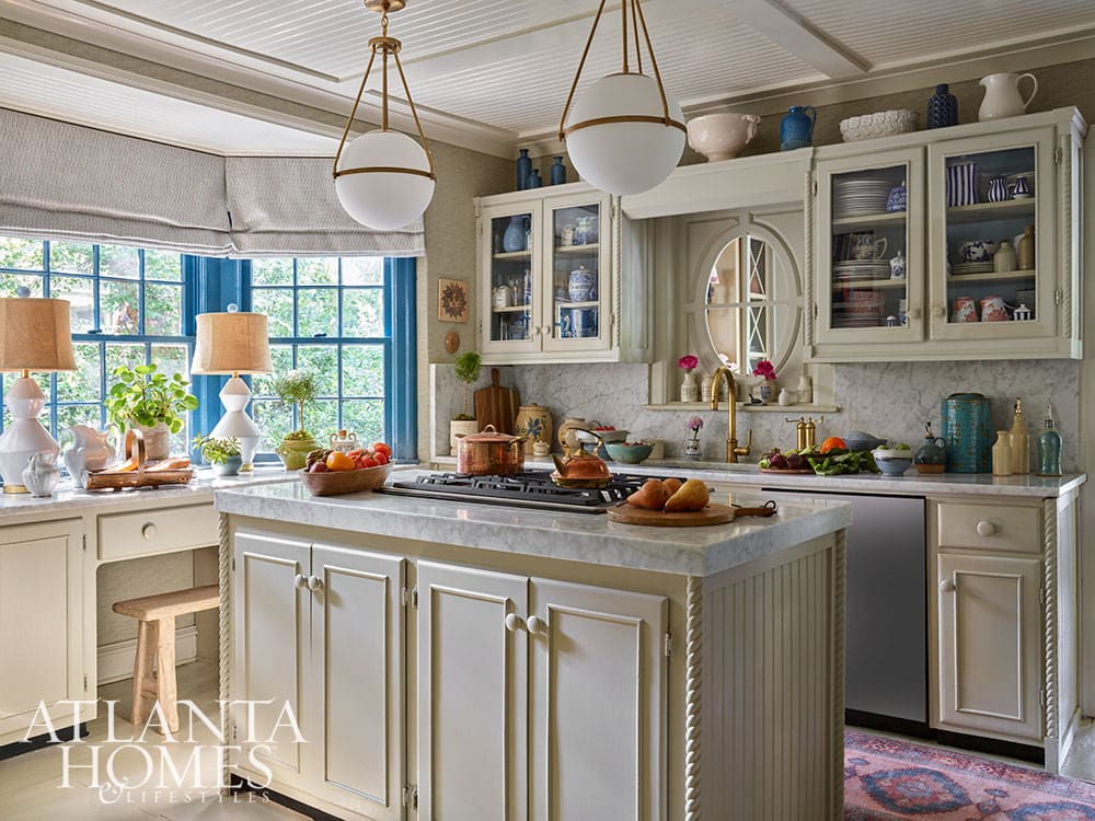 The timeless Atlanta home of architect Robert Norris of Spitzmiller and Norris architects photographed by Emily Followill and in this nonth's Atlanta Homes & LIfestyles is utter perfection. Such a charming kitchen with pendant lights above the isalnd