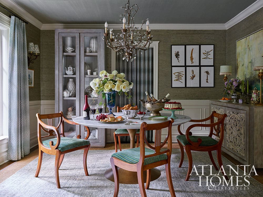 The house of architect Robert Norris of Spitzmiller and Norris architects photographed by Emily Followill and in this nonth's Atlanta Homes & LIfestyles is utter perfection. Loe the round dining table perfect for conversation