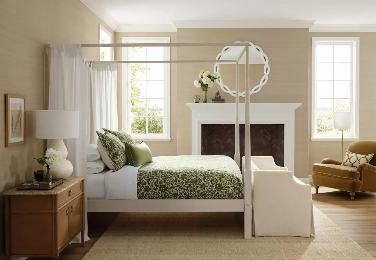 love the white canopy bed and green and white bedding - beautiful home tours