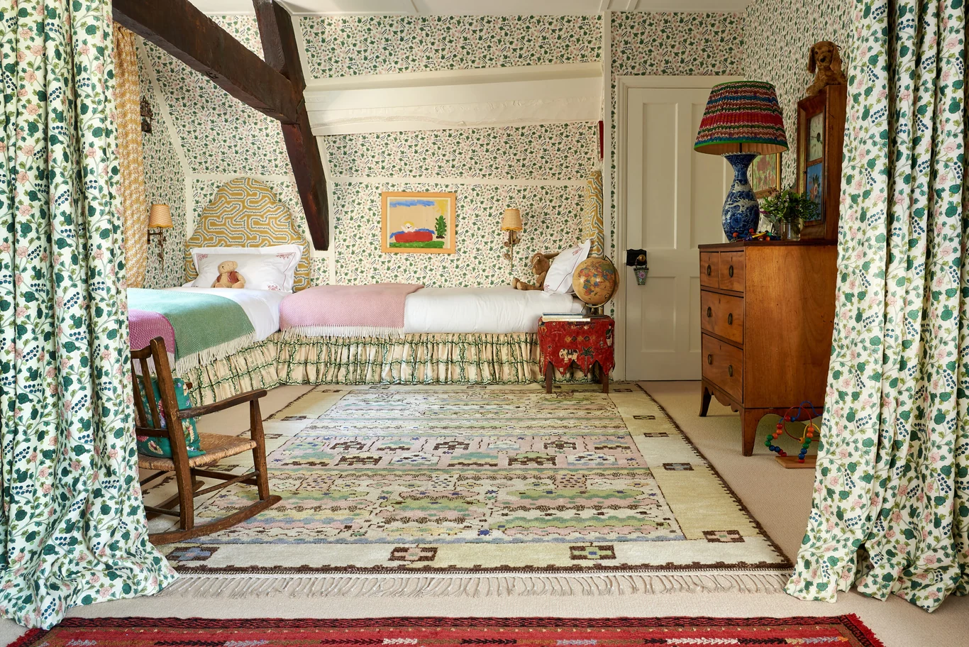 Vanrenen Hanbury Interior Design | Mike Garlick Photography - twin beds in the charming wallpaper in green and white