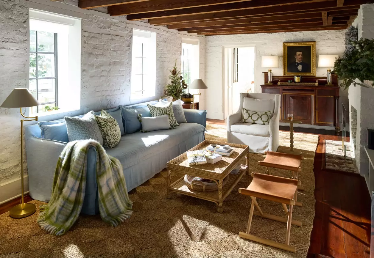 Beautiful home tours in every style - love the blue sofa in the cozy home with wood beams