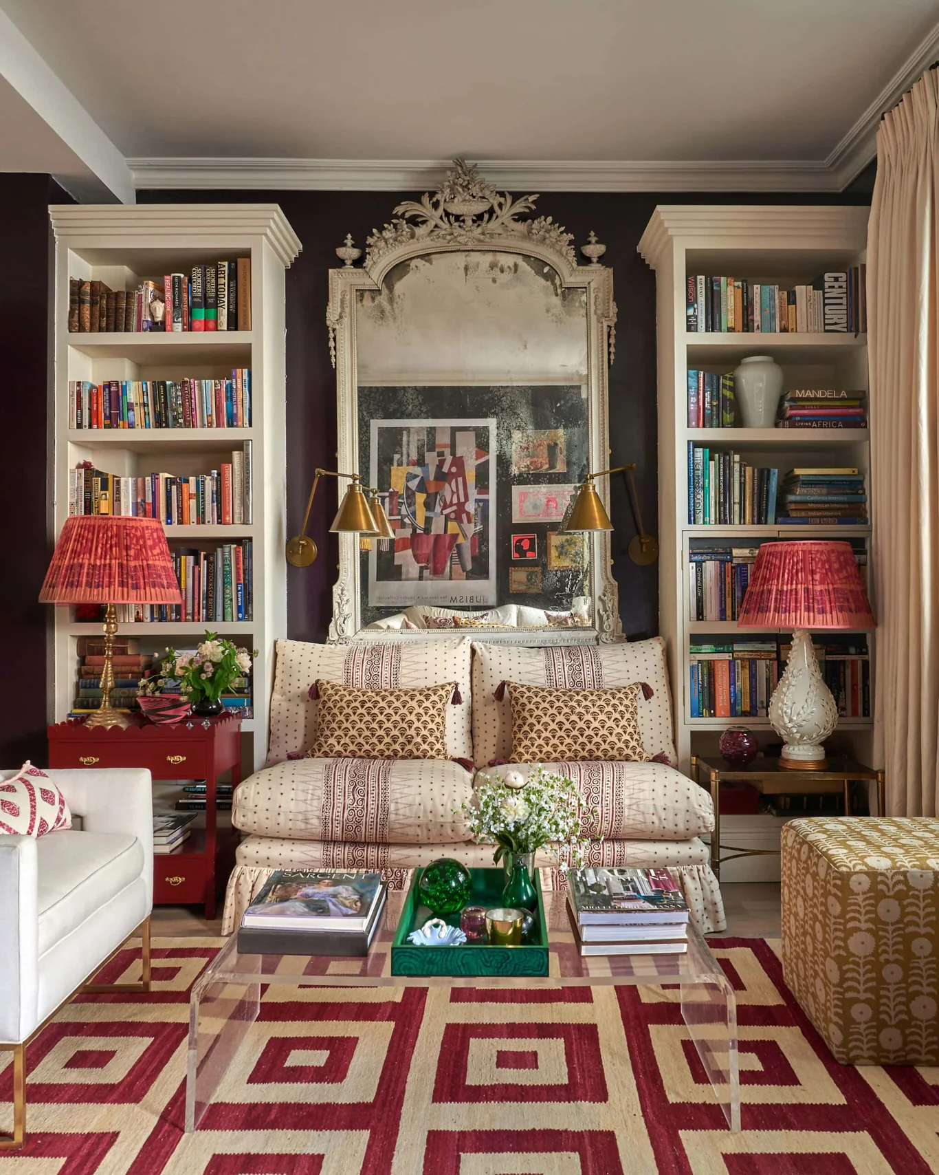 Vanrenen Hanbury Interior Design | Mike Garlick Photography - living room with large mirror and bookcases