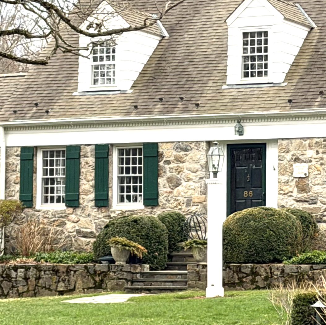 There is absolutely nothing like making an entrance, a grand first impression, in our lives and in our homes. This stone house, photographed by The Potted Boxwood is the best of the best when it comes to curb appeal.