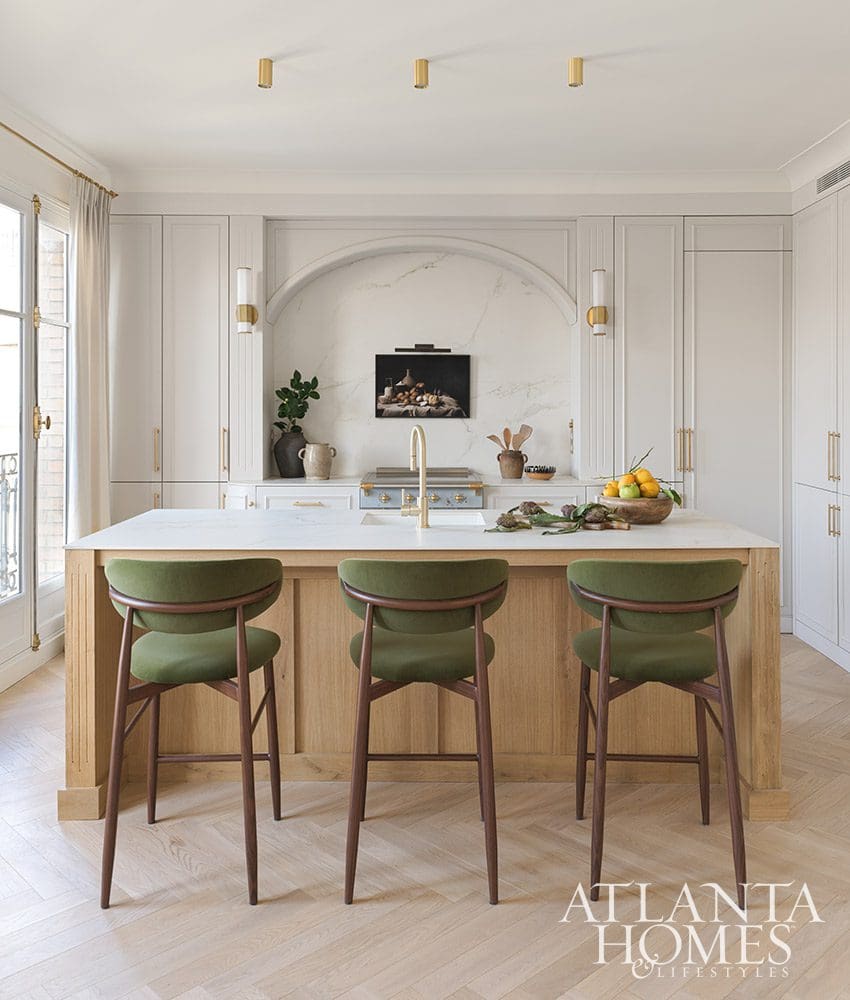 Paris is always a good idea, and when Ann Huff of Huff Harrington is designing your home, it's an even better one! Love the kitchen island with green velvet stools - Source: Atlanta Homes & Lifestyles | Interior Design: Ann Huff, Huff Harrington |  Photographed by Joan Porcel