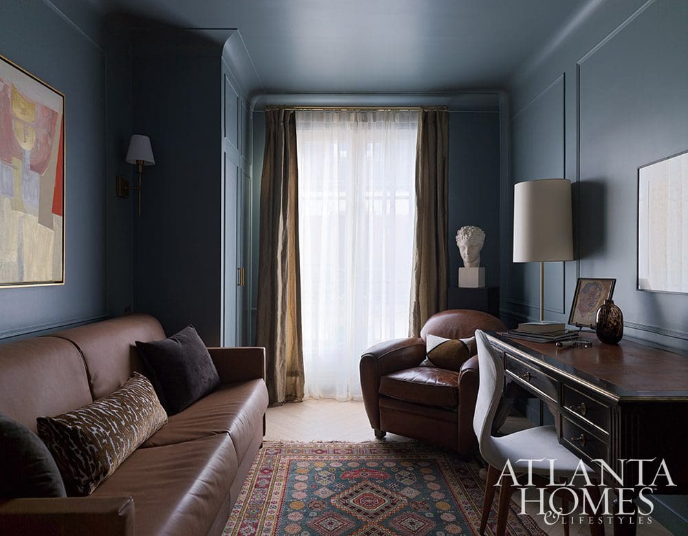 Paris is always a good idea, and when Ann Huff of Huff Harrington is designing your home, it's an even better one! Love the dark moody blue home office - Source: Atlanta Homes & Lifestyles | Interior Design: Ann Huff, Huff Harrington |  Photographed by Joan Porcel