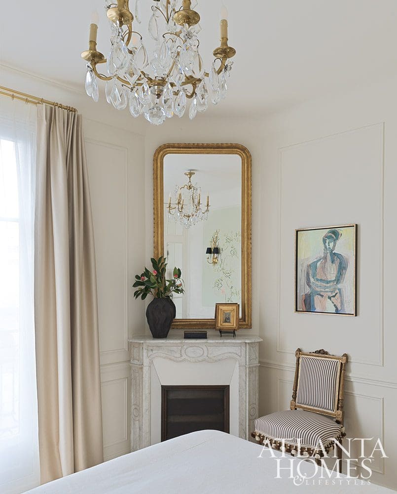  Love the charming corner fireplace in this Paris apartment and a hanging crystal chandelier - Source: Atlanta Homes & Lifestyles | Interior Design: Ann Huff, Huff Harrington |  Photographed by Joan Porcel