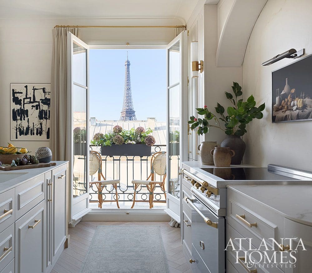 Paris is always a good idea, and when Ann Huff of Huff Harrington is designing your Paris apartment, it's an even better one! The most charming kitchen with a view of the Eiffel tower - Source: Atlanta Homes & Lifestyles | Interior Design: Ann Huff, Huff Harrington |  Photographed by Joan Porcel