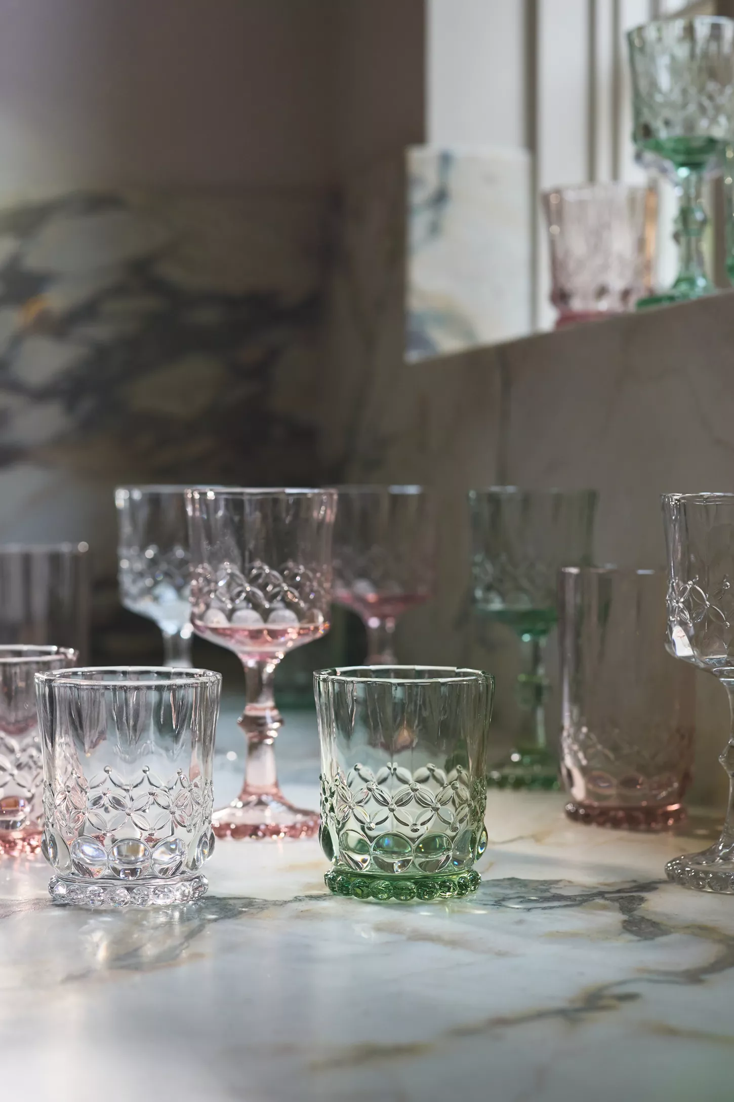 Anthropologie Savannah Collection wine glass featuring a vintage-inspired floral diamond motif and sculptural beaded glass base.
